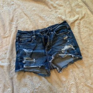 Distressed denim shorts